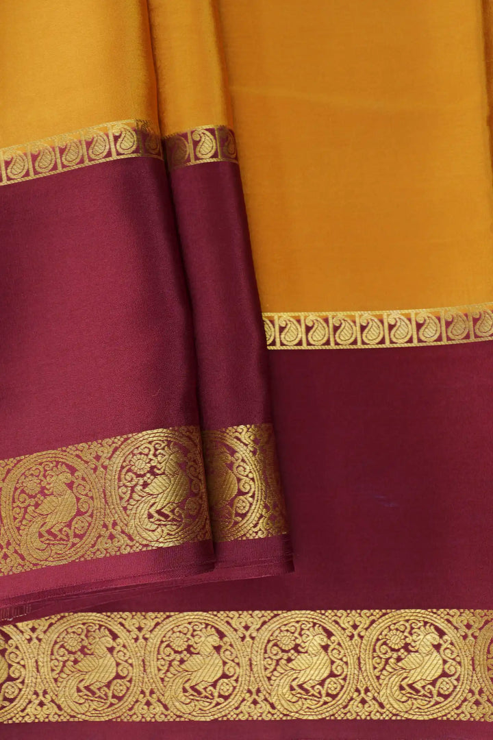 Mustered Mysore Silk Saree with maroon border and peacock design