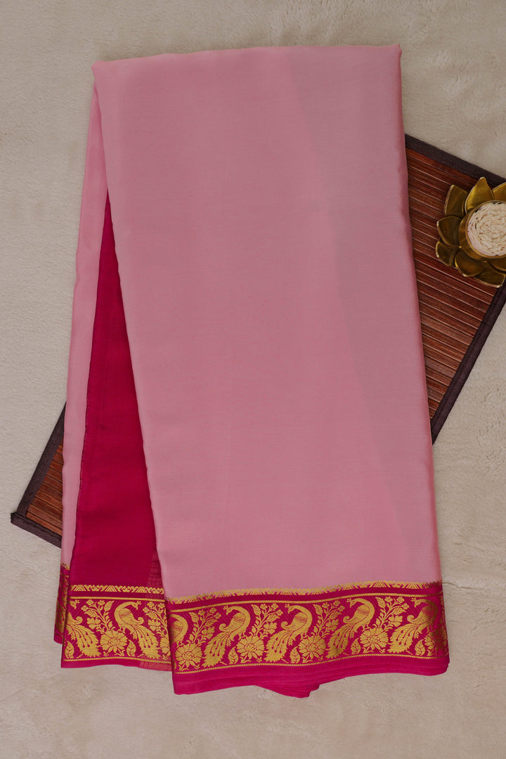 Baby Pink Pure Gold Lace Mysore silk saree with a Pink and Peacock gold border with Contrast Blouse