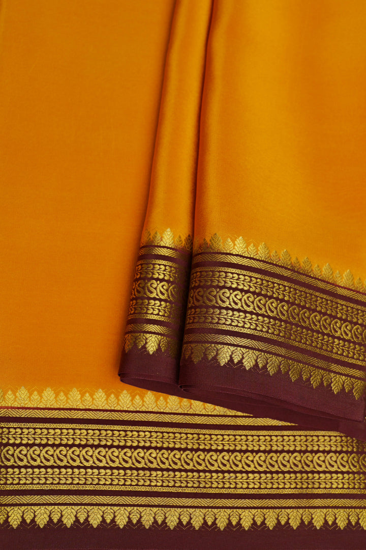Small Mango Border Pure Mysore Silk Saree in Yellow Color with Contrast Brown Border and Contrast Blouse