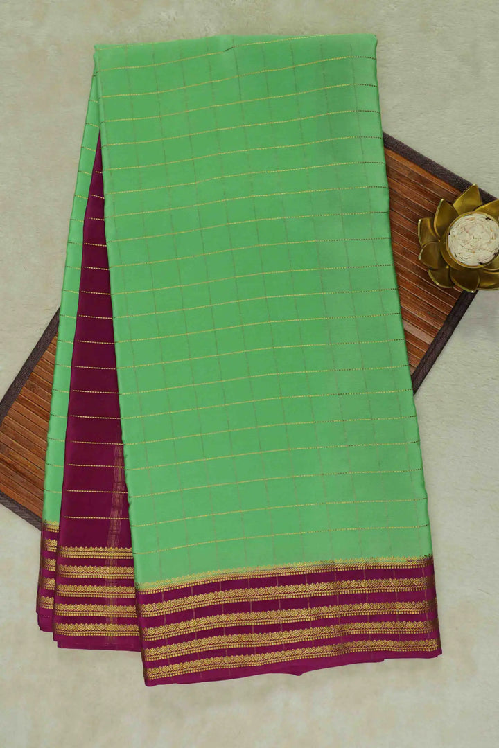 Big Gold Lace border Pure Mysore Silk Saree in Green and Maroon Color with Contrast Maroon Blouse