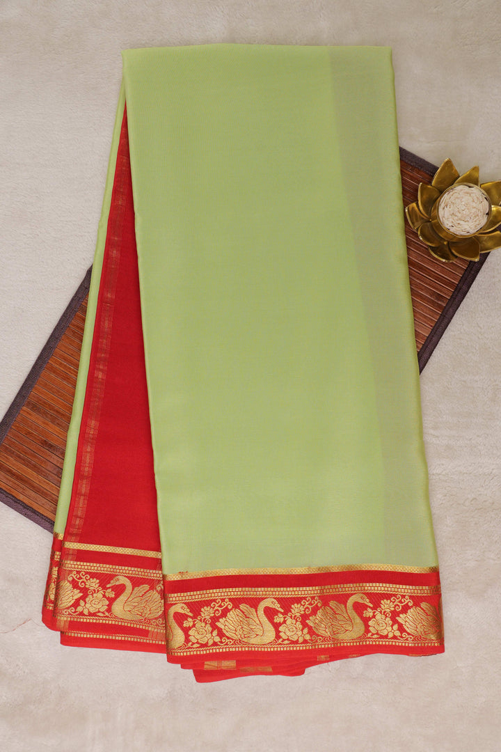 Swan border Pure Gold Lace Mysore Silk Saree in Green and Orange Color with Contrast Blouse