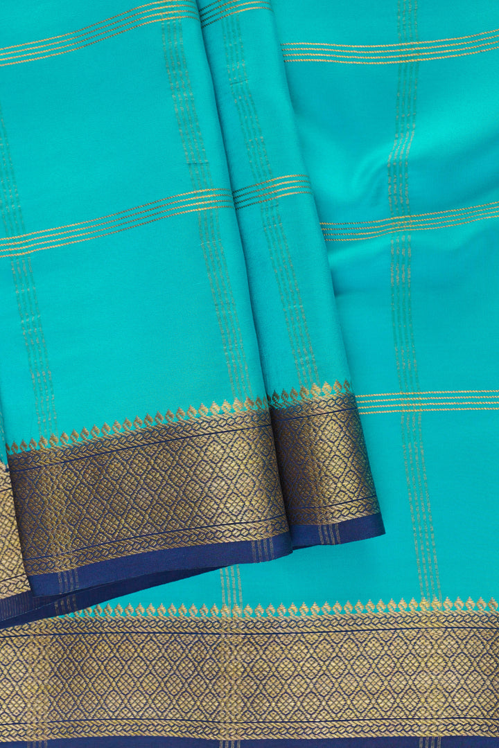 Mysore Silk Saree in Aqua Blue with Golden Work and Dark Blue Border