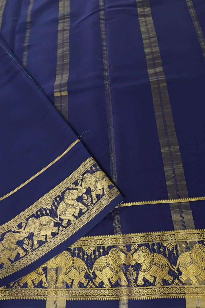Mysore Silk Saree in Green with Blue Pallu and Gold Elephant patterns