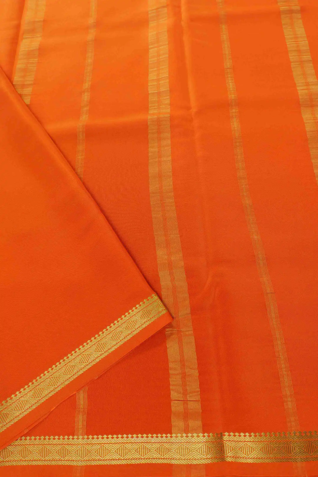 Mysore Silk Saree in green with a contrasting orange pallu