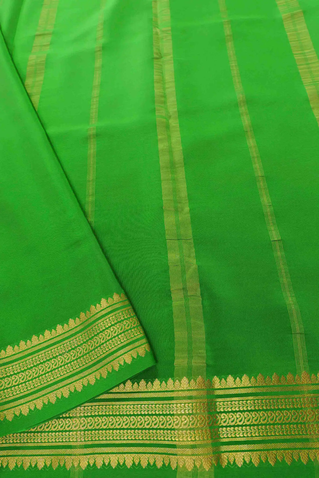 Mysore Silk Saree in red with a contrasting green pallu and gold zari work