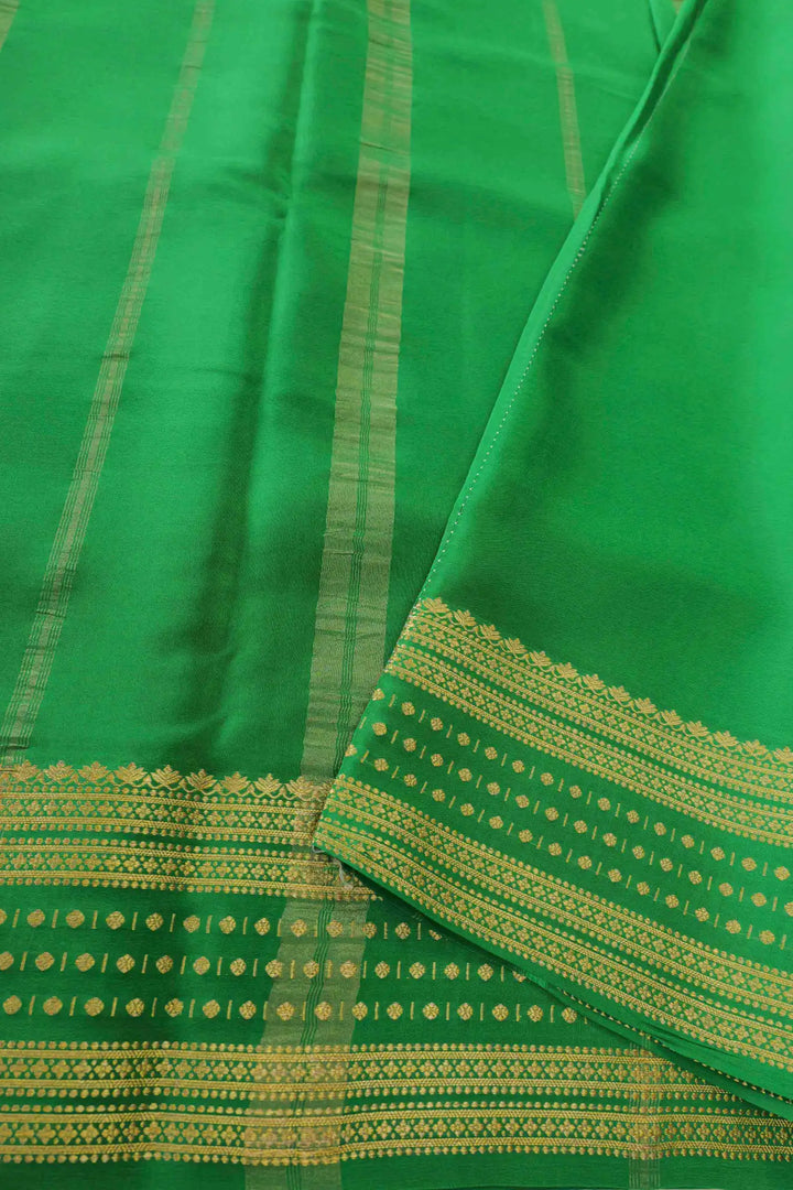 Mysore Silk Saree in red with green-gold border and green pallu.