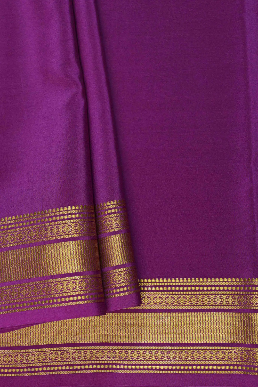 Mysore Silk Saree in rich purple hue with elegant golden border detailing