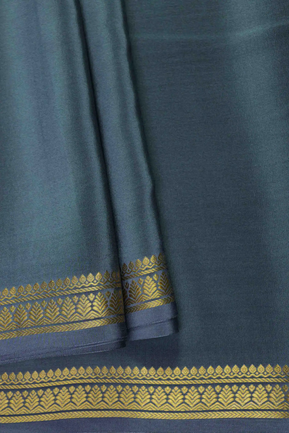 Mysore Silk Saree in teal blue hue with rich golden border detailing