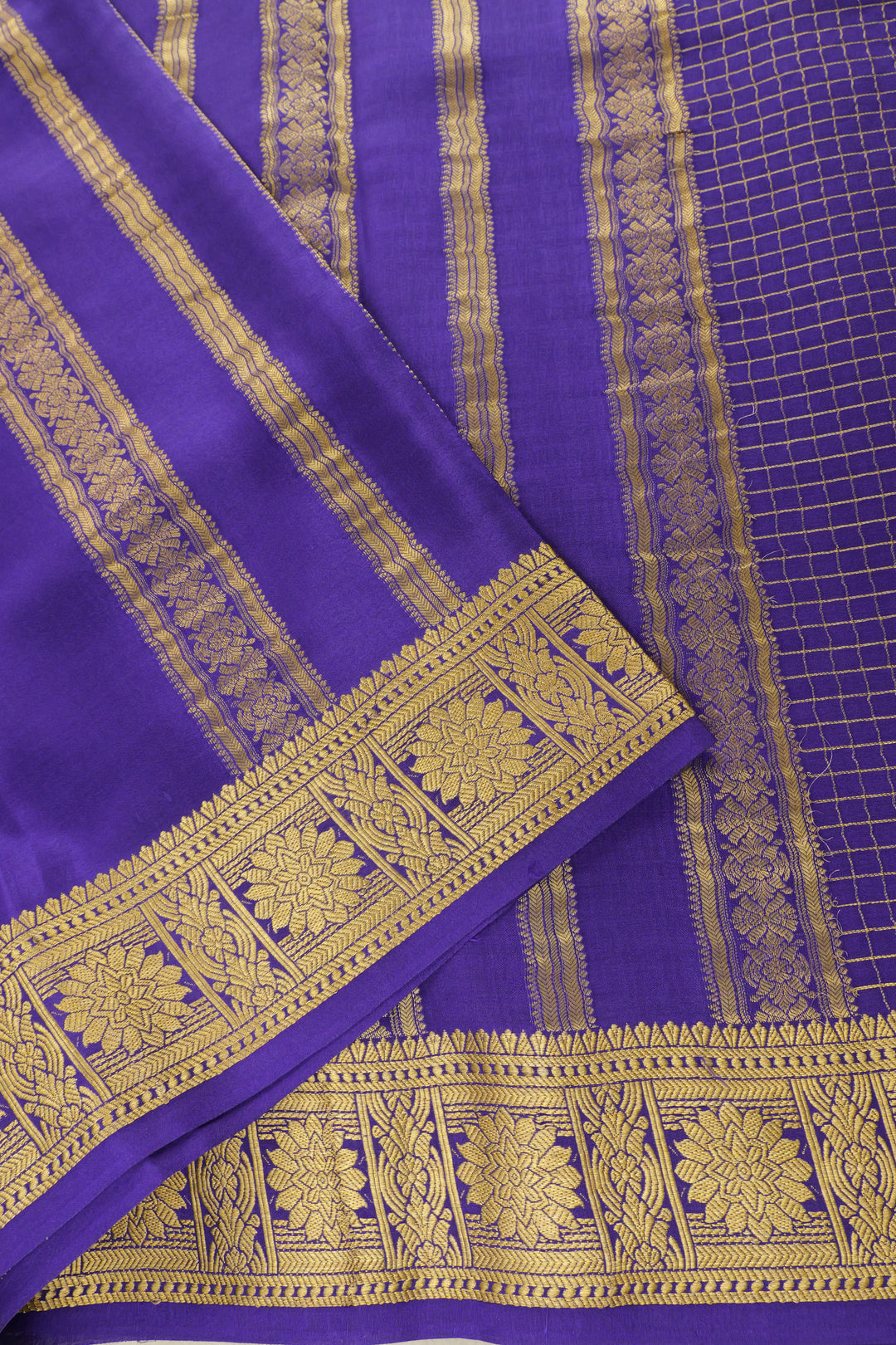 Mysore Silk crepe saree with purple pallu and gold zari patterns
