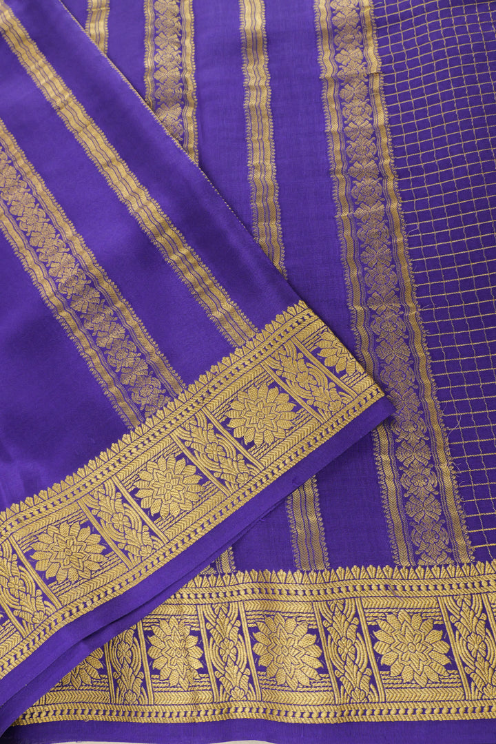 Mysore Silk crepe saree with purple pallu and gold zari patterns