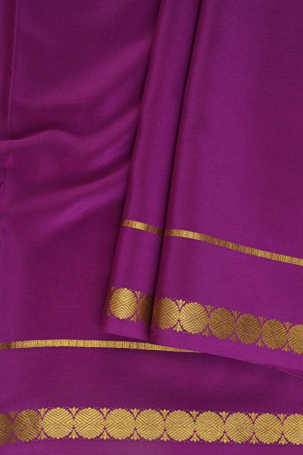 Mysore crepe silk saree in deep magenta with gold border design