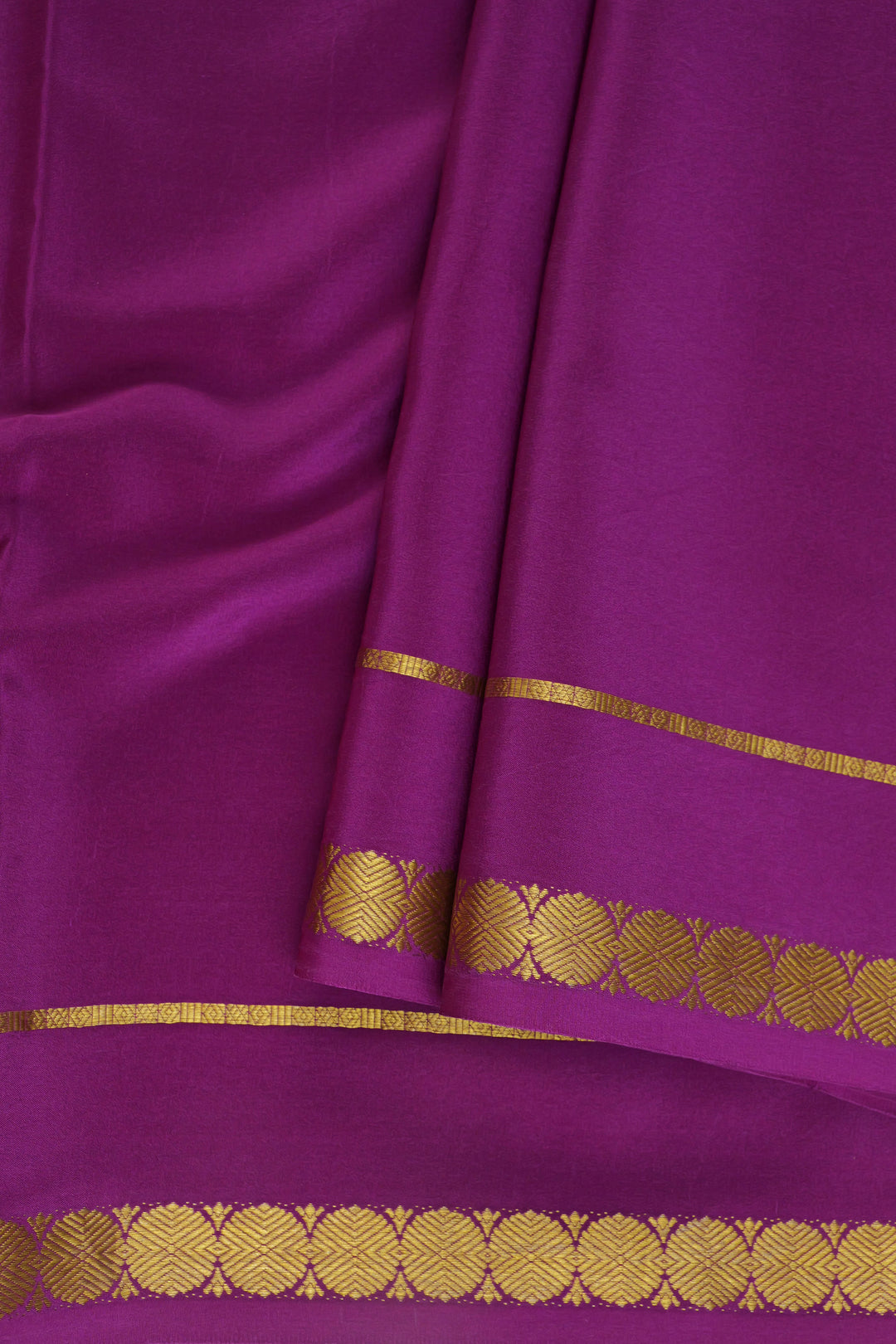 Mysore crepe silk saree in deep magenta with gold border design
