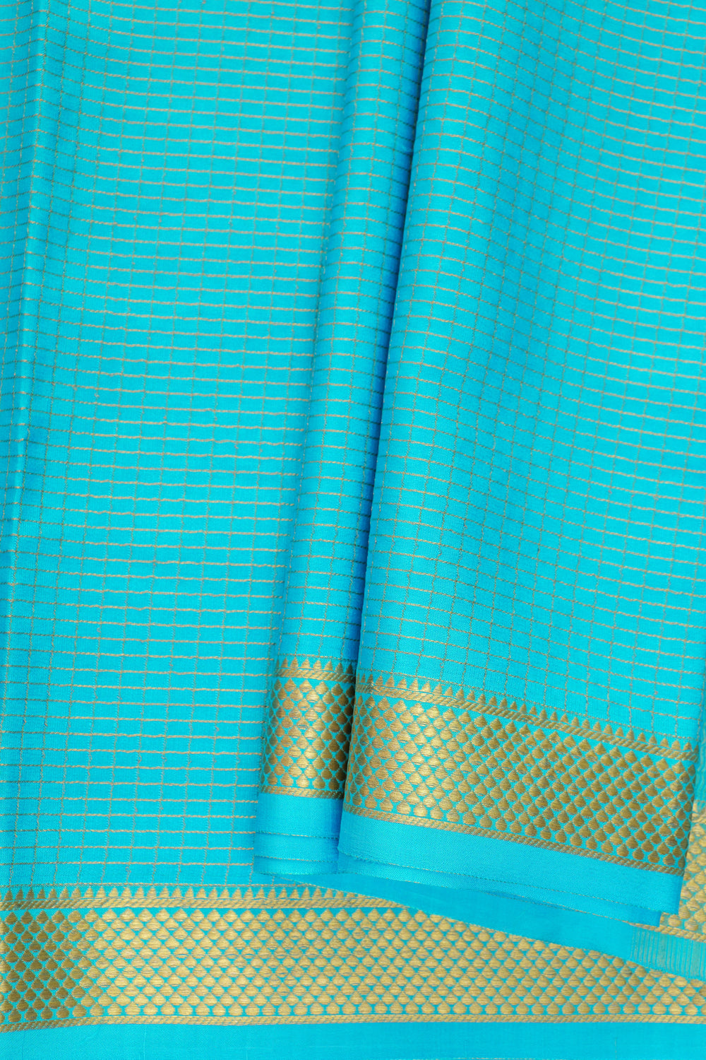 Mysore crepe silk saree in turquoise with gold border