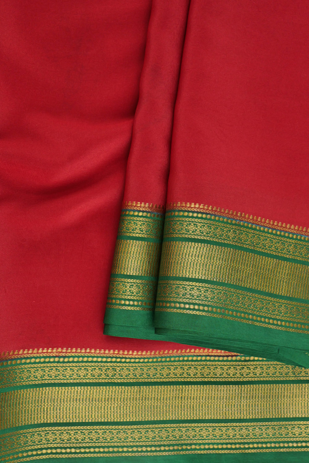 Mysore crepe silk saree in vibrant red with golden border