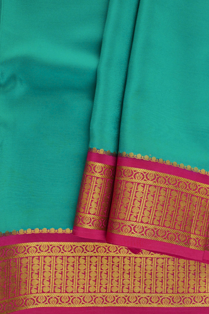 Mysore silk saree green body and contrast pink blouse
