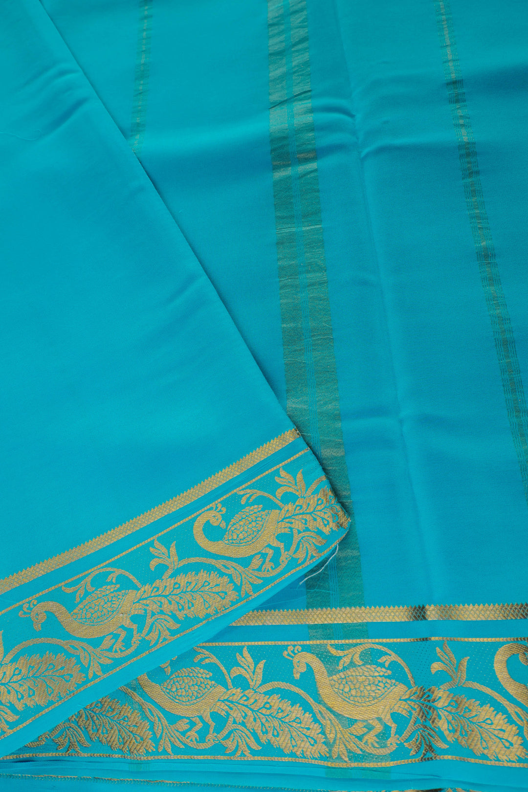 Mysore silk saree in bright pink with blue pallu and gold zari border