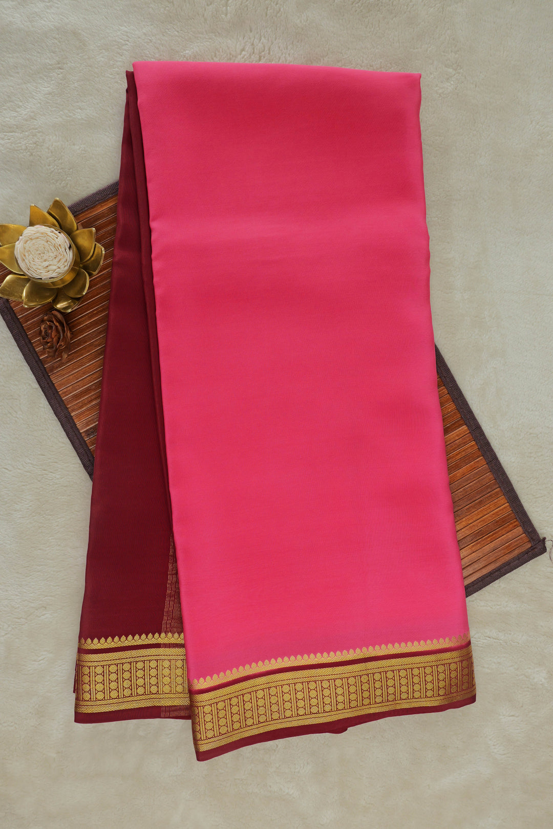 Mysore silk saree in bright pink with golden woven border and maroon
