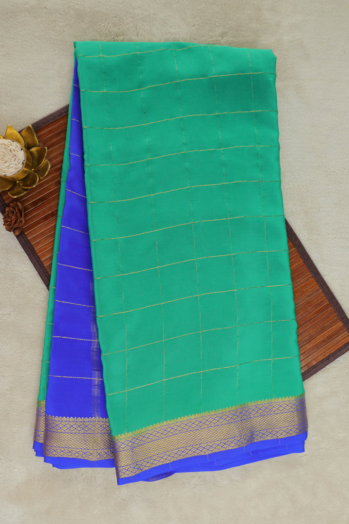 Mysore silk saree in green with blue pallu and gold border
