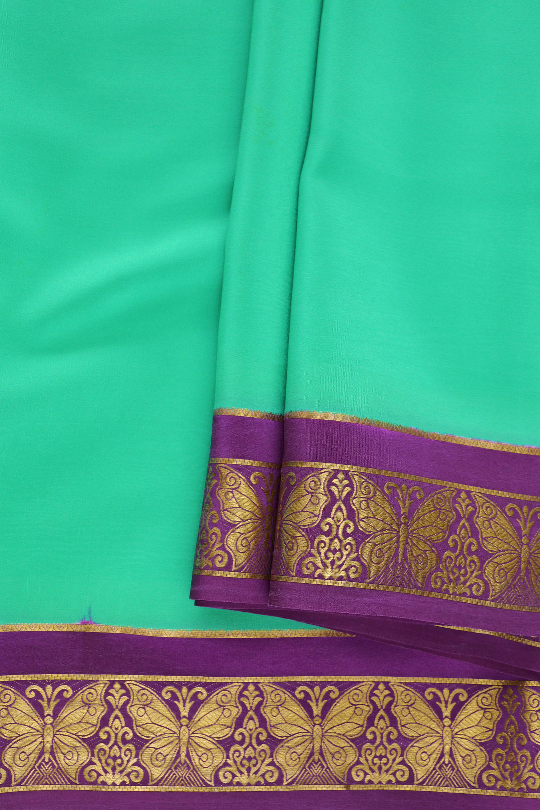 Mysore silk saree in green with purple pallu and gold border