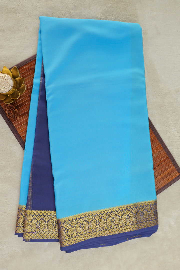 Mysore silk saree in light blue with a dark blue and gold border
