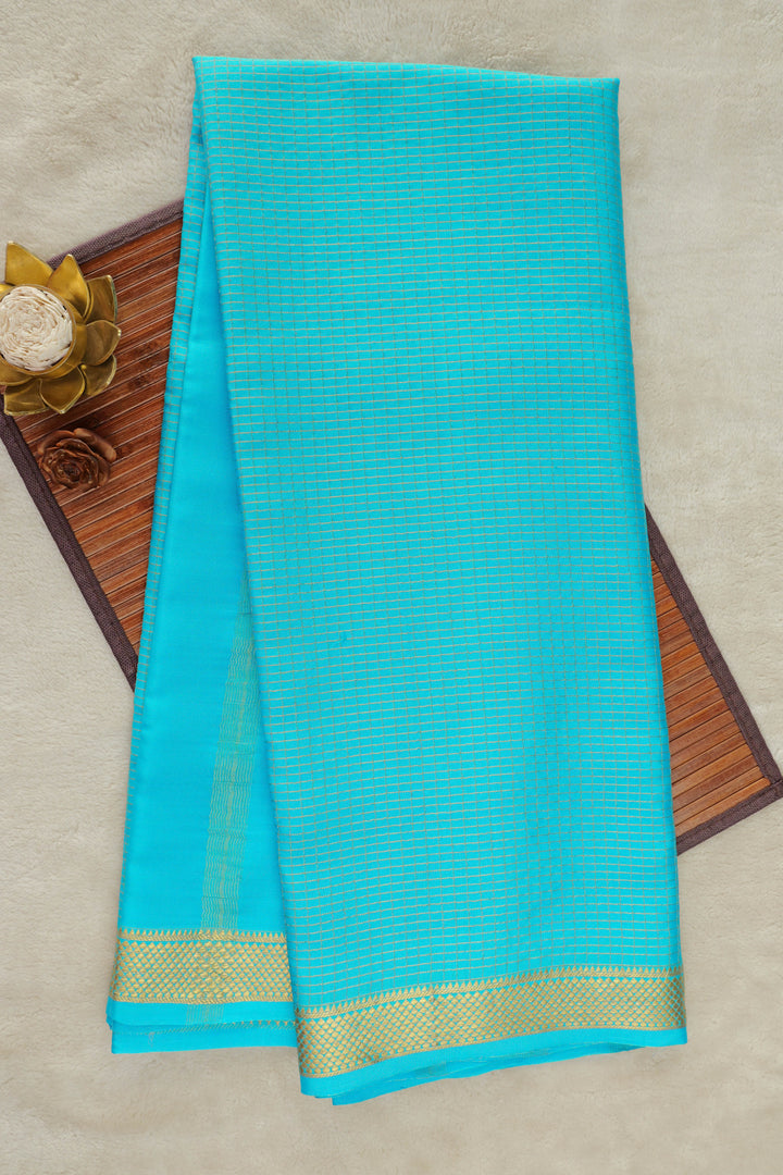 Mysore silk saree in turquoise blue with gold border