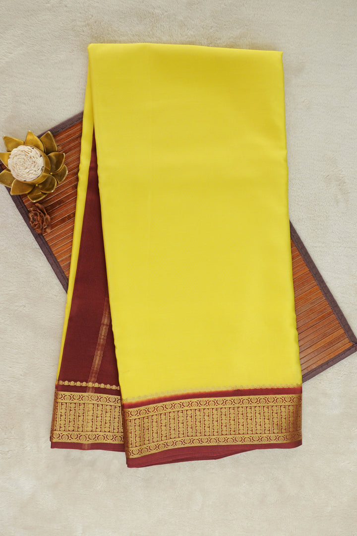 Mysore silk saree in yellow with maroon pallu and gold border