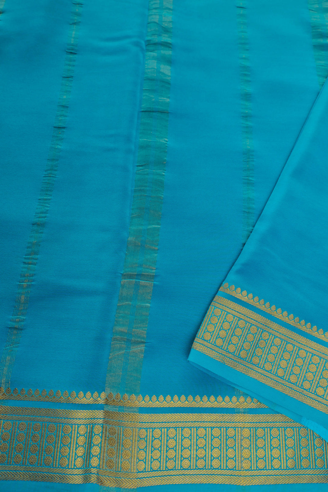 Mysore silk saree with contrasting blue and golden zari border