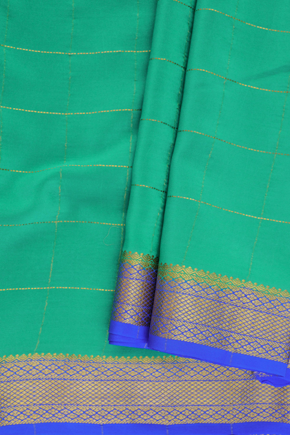 Mysore silk saree with elegant green checks and golden zari border