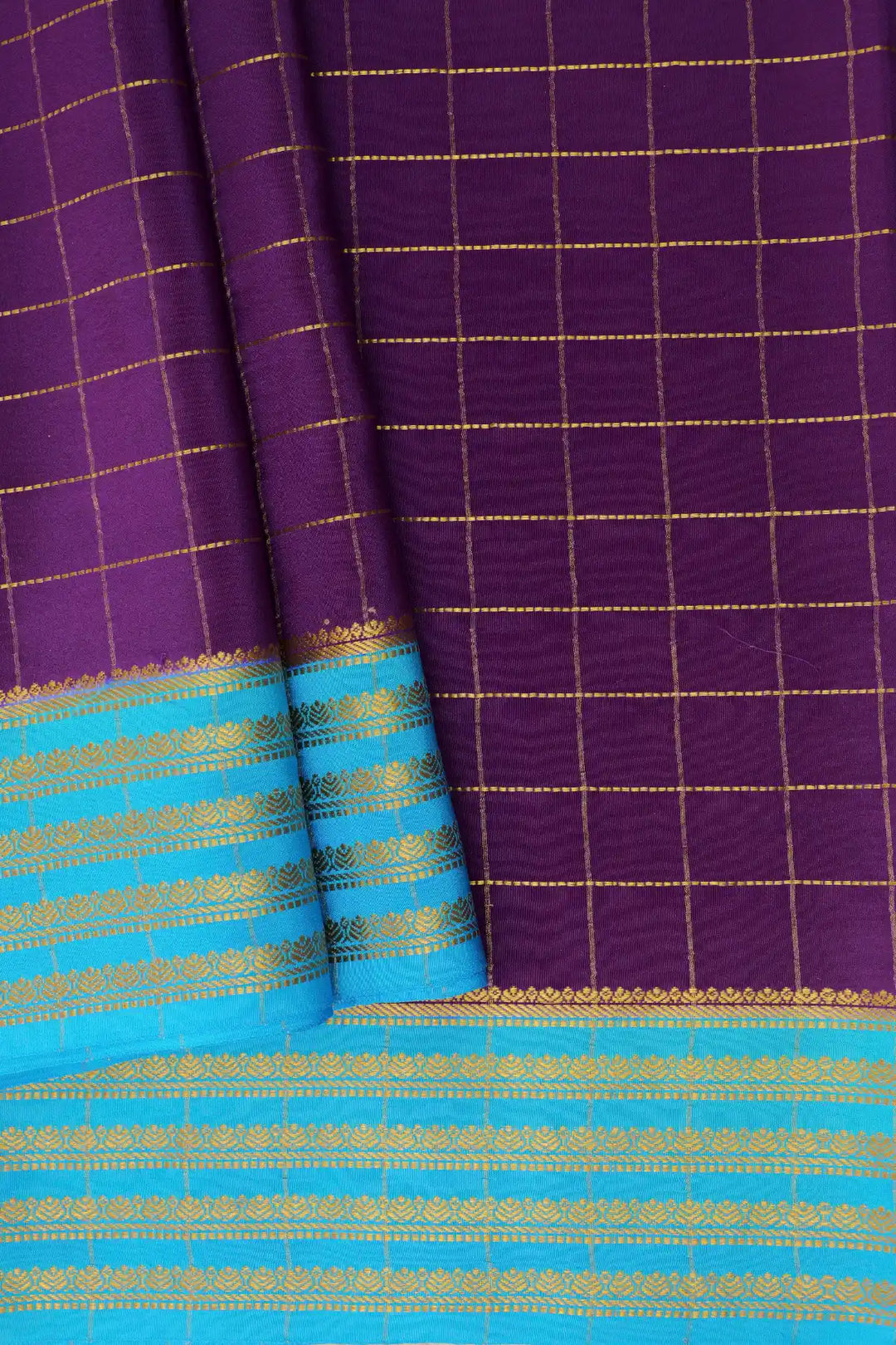 Mysore silk saree with gold checks and blue pallu