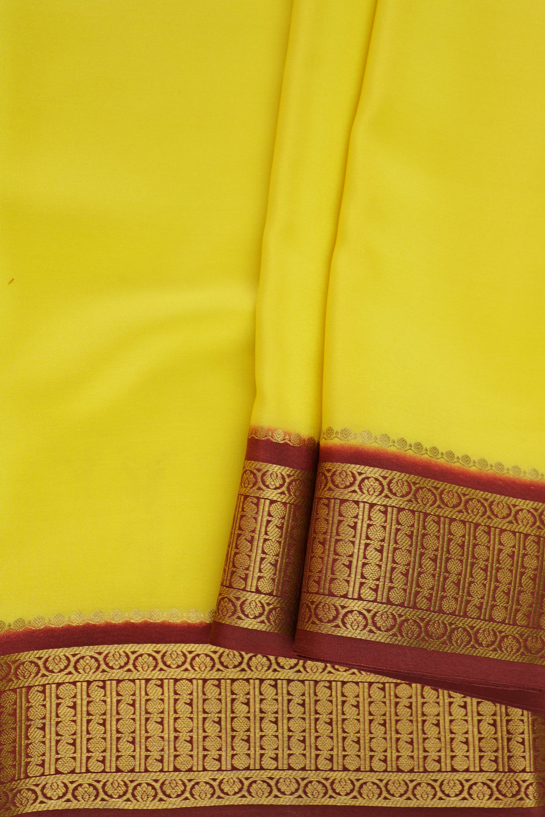 Mysore silk saree with plain yellow design and zari border