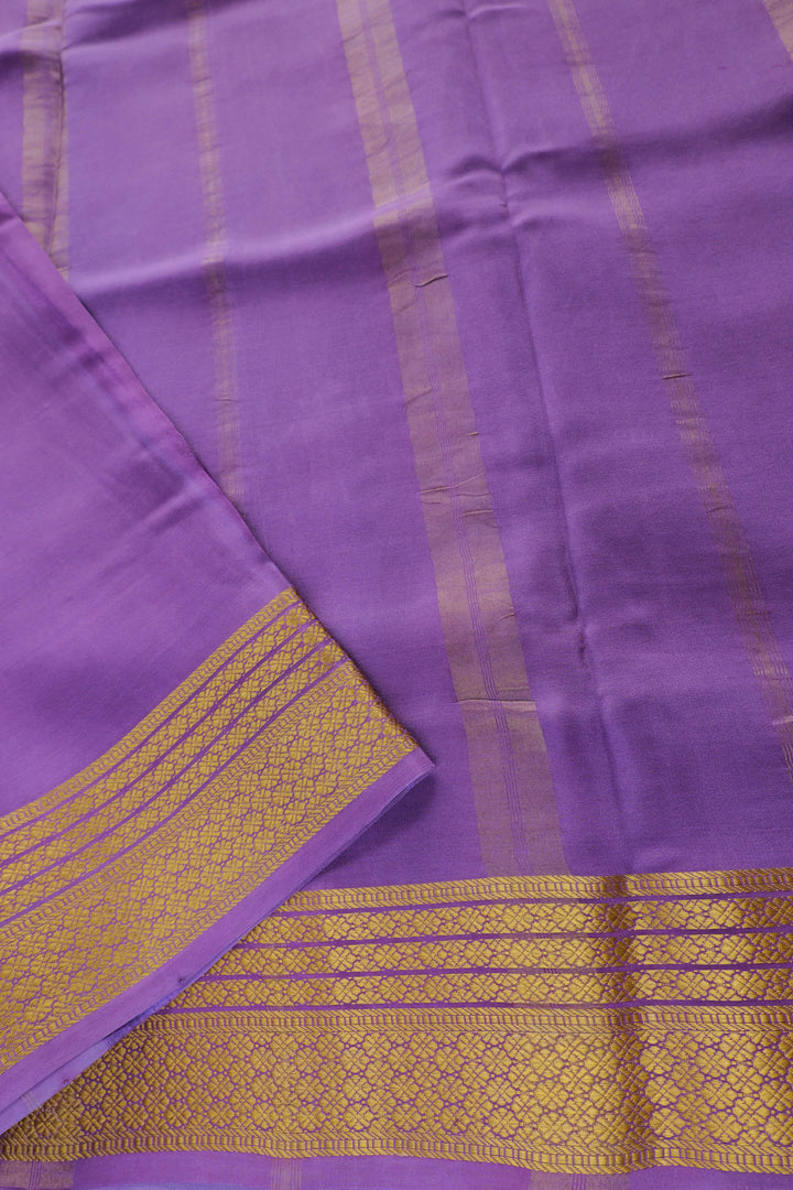 Mysore silk saree with purple pallu and golden border work