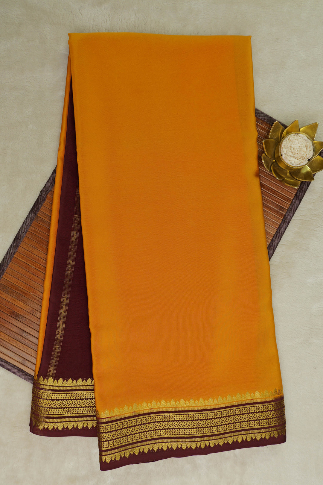 Orange Mysore Silk Saree with contrasting Maroon and gold Border