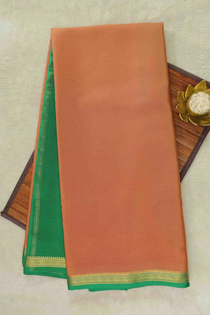 Orange Mysore Silk Saree with green zari border, matching green pallu