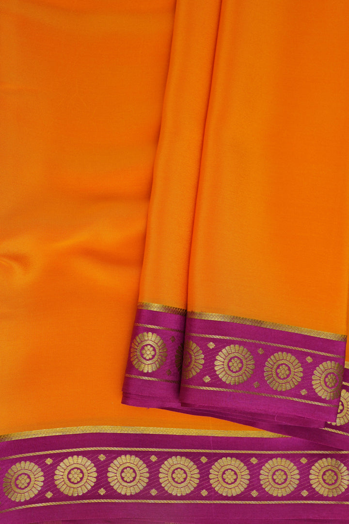 Orange Mysore crepe silk saree with pink border