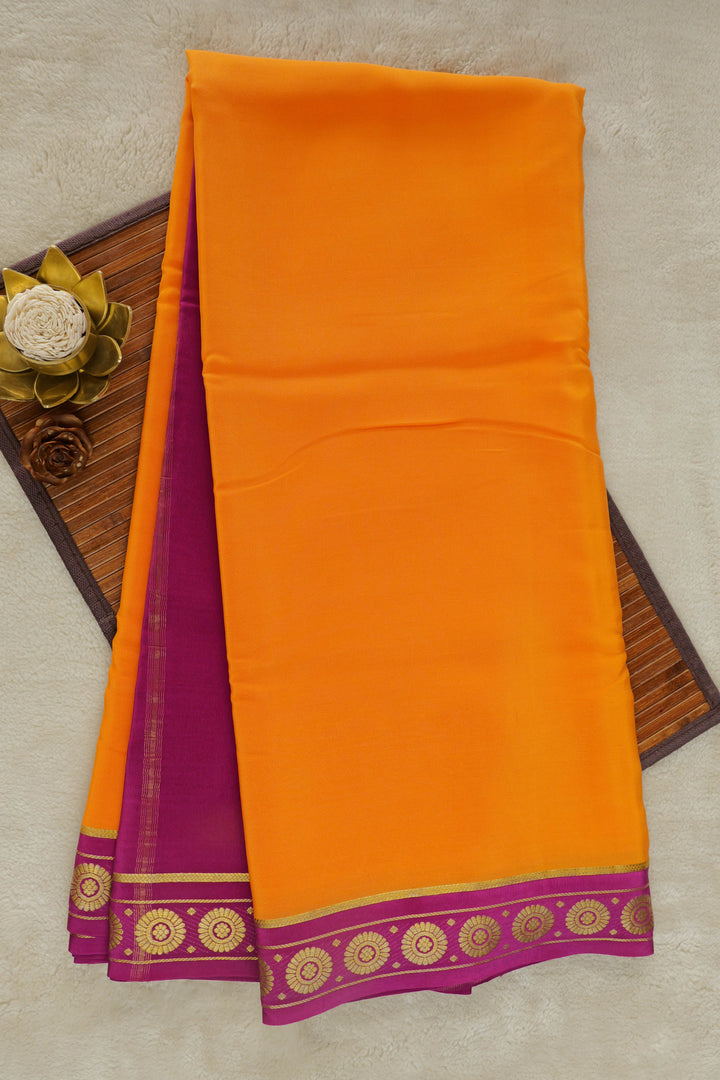 Orange Mysore silk saree with contrast pink border