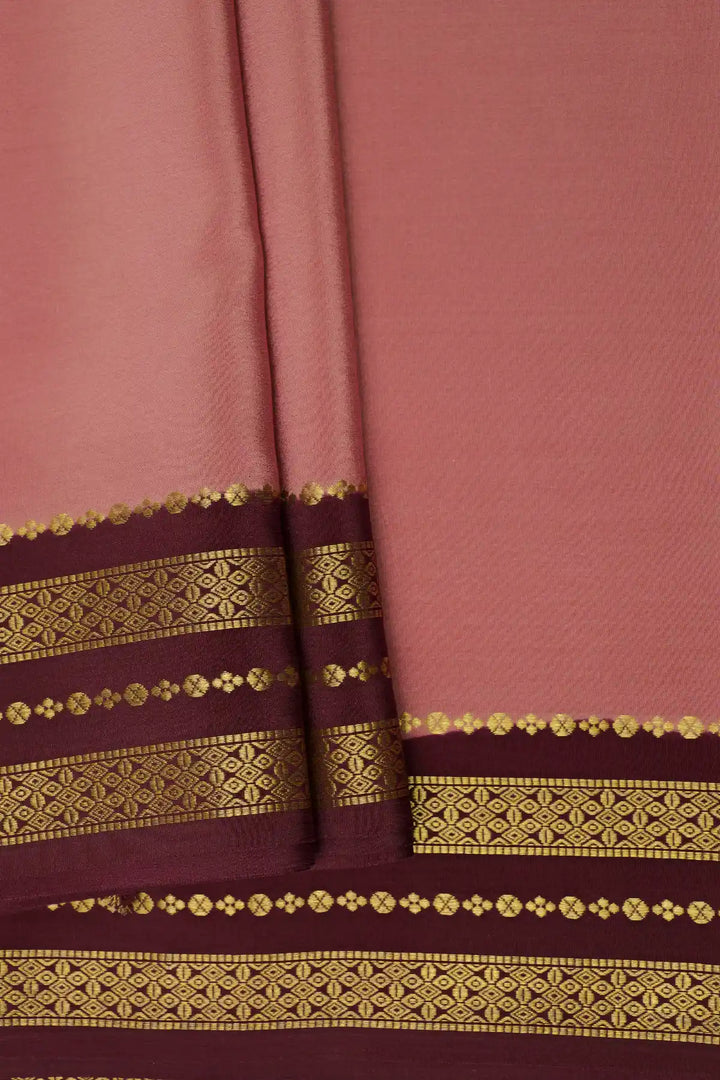Pastel pink silk saree with brown border