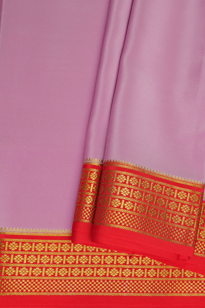 Pink Mysore Silk saree with red edge and golden design