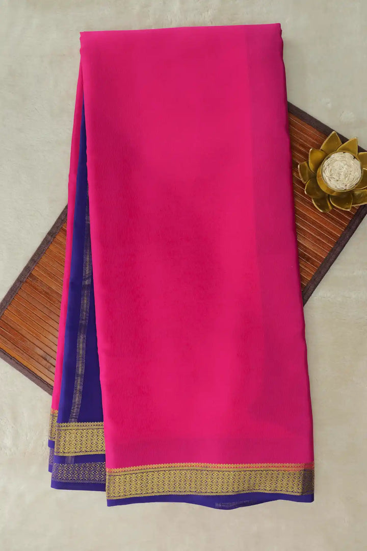 Pink Mysore silk saree with blue border and gold zari