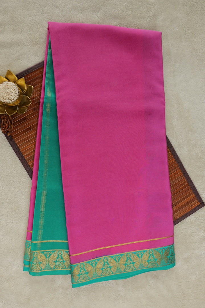 Pink Mysore silk saree with green zari border