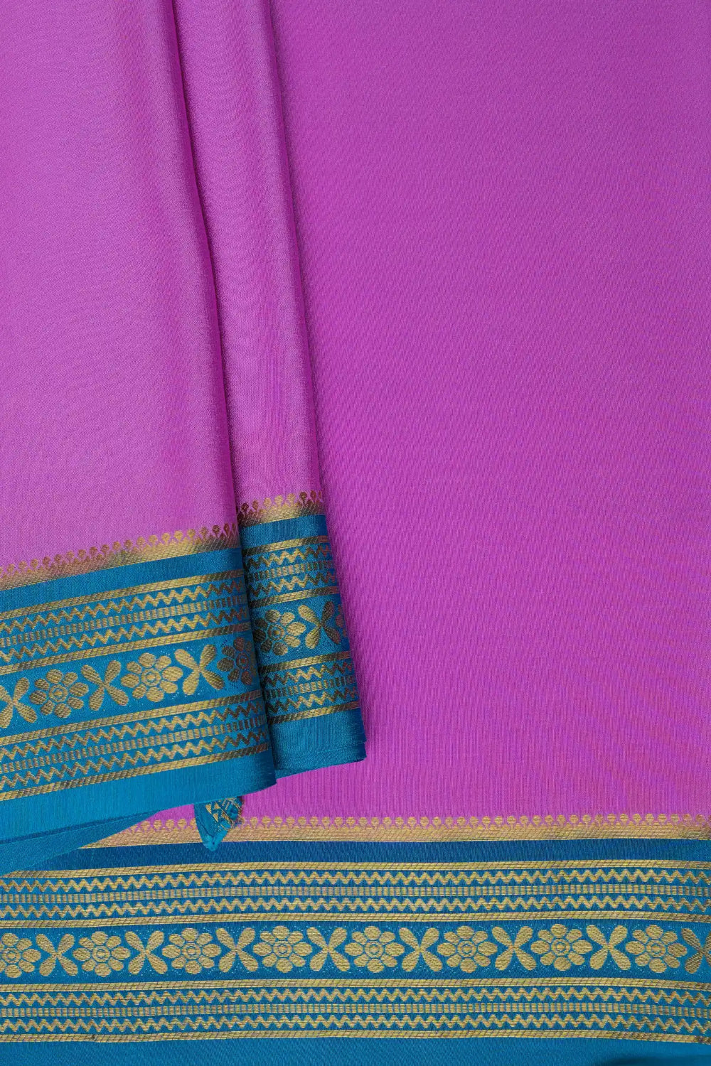Pink silk saree with contrast blue border