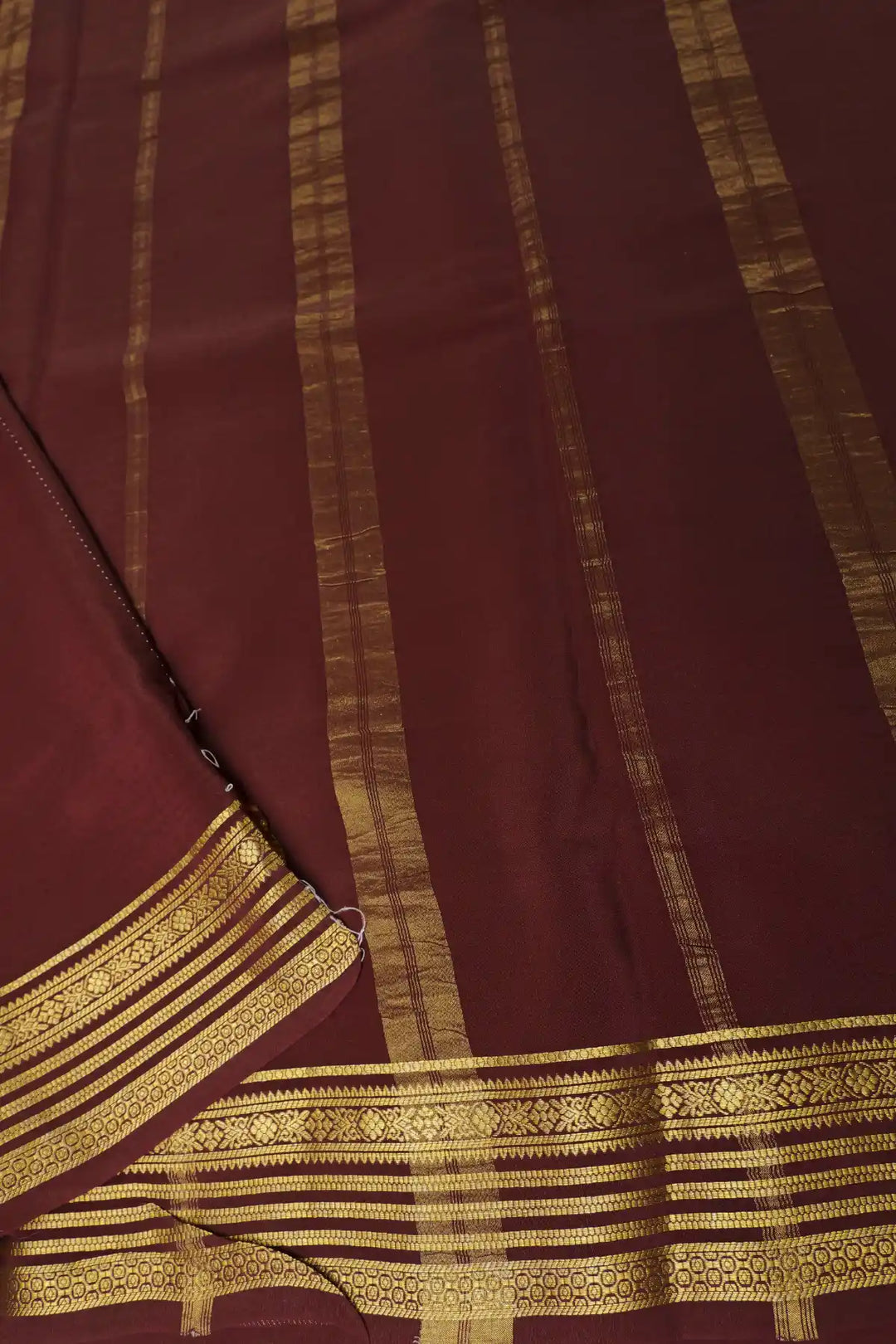Pink silk saree with gold zari border