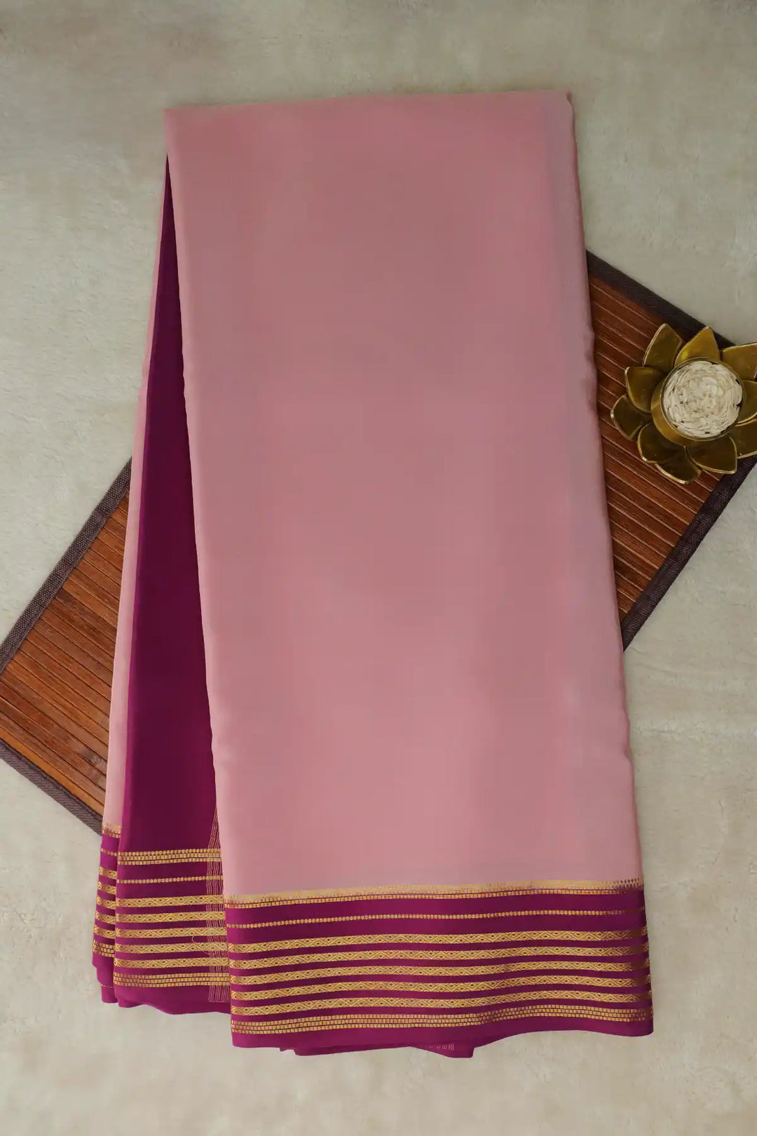 Pink silk saree with maroon border and gold zari