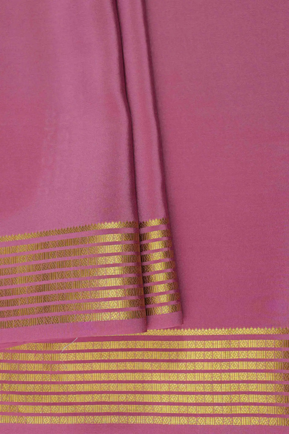 Plain pink Mysore Silk Saree with golden border detailing