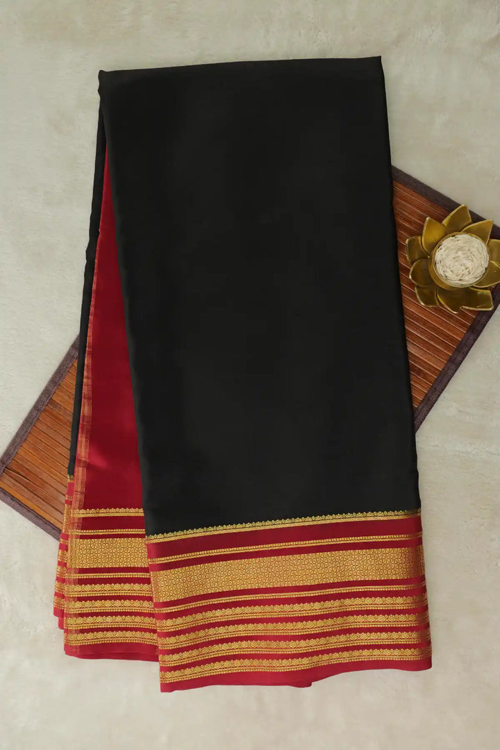 Pure Mysore silk saree in black with red gold border