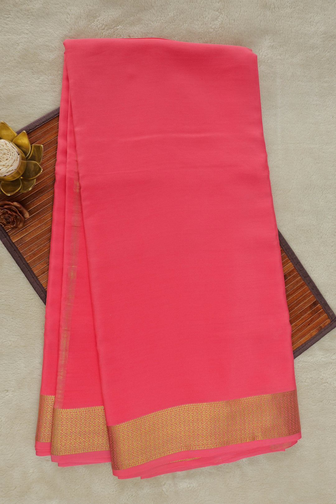 Pure Mysore silk saree in bright pink with a rich golden zari border