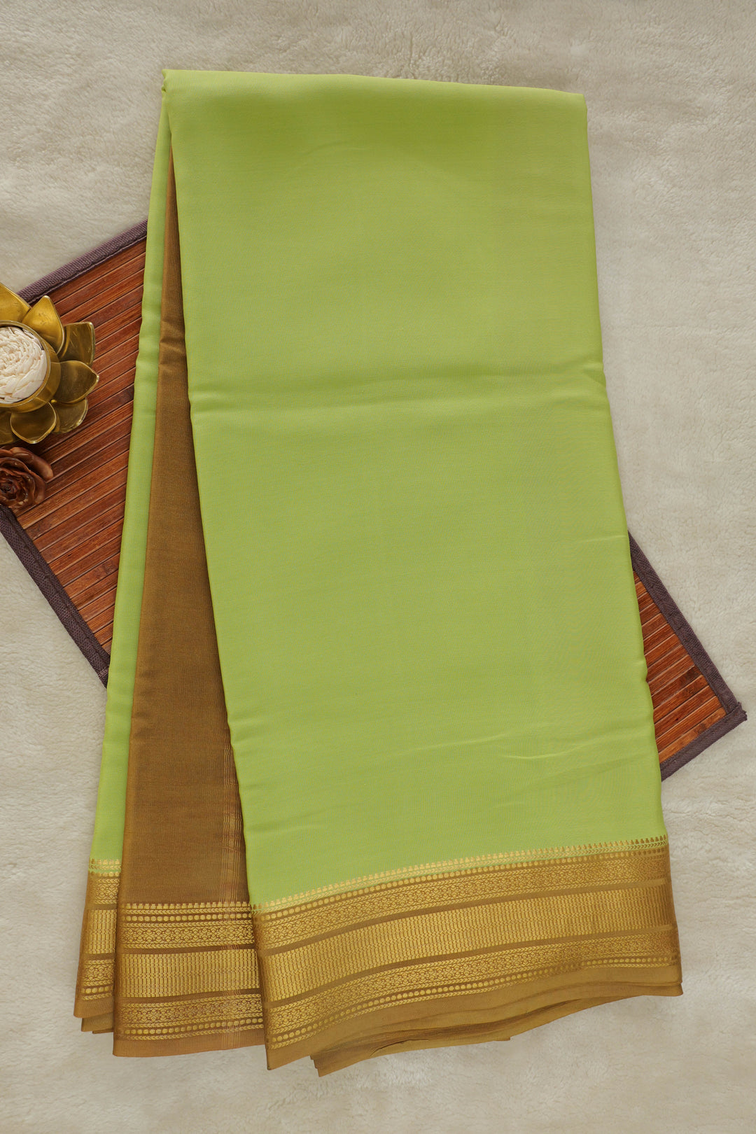 Pure Mysore silk saree in light green with rich gold zari border
