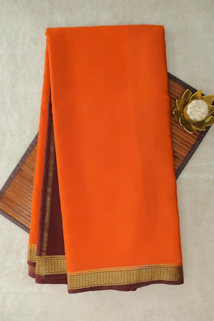 Pure Mysore silk saree in orange with gold border