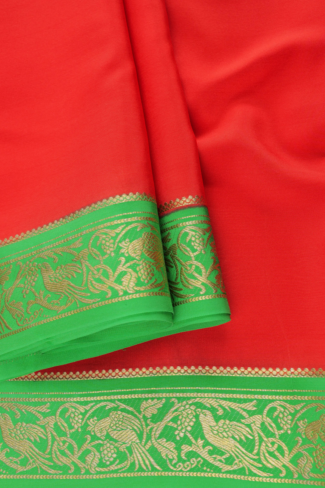 Pure Mysore silk saree in red with golden parrot embroidery on a green border