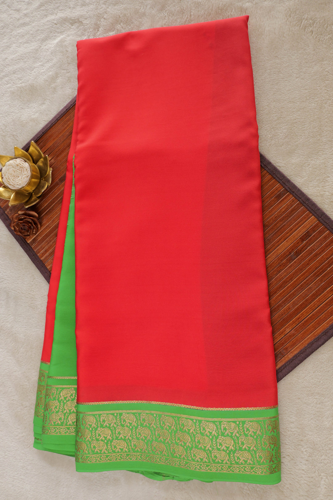 Pure Mysore silk saree in rich red with green border and gold zari elephant motifs