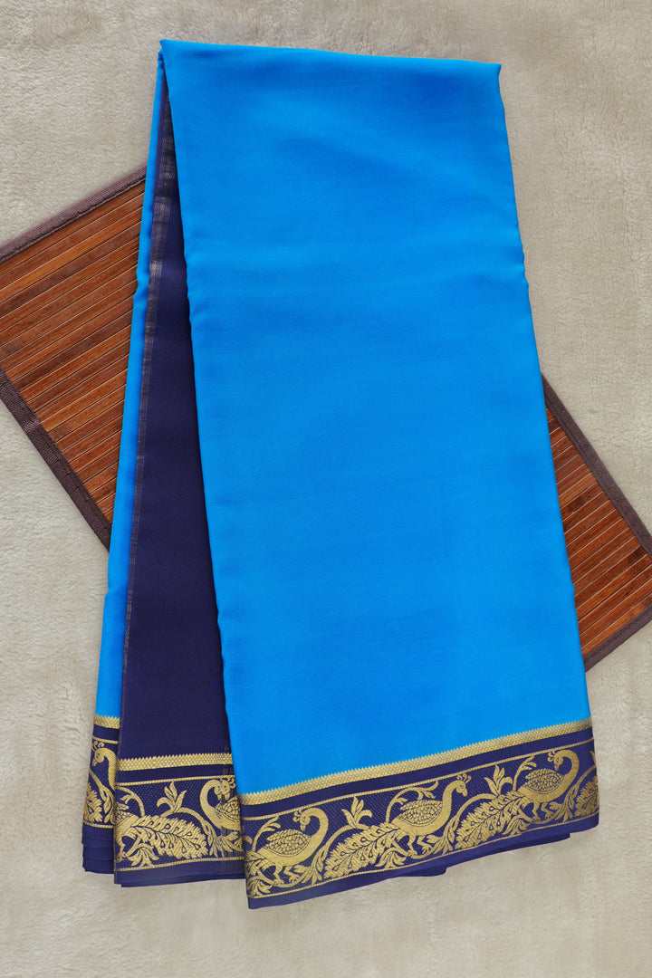Pure Mysore silk saree in royal blue with a contrasting navy and gold zari border